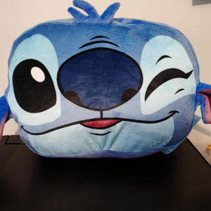 Zacht blauw Stitch pluche handwarmer kussen met lachend gezicht, grote ogen en lange oren.