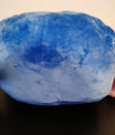 Onderkant van een blauw Stitch pluche handwarmer kussen, volledig in zachte pluche stof met zichtbare opening aan de zijkant.